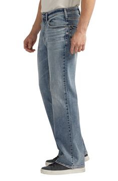 Made from faded stretch denim, these relaxed-fit jeans sit below the waist and are cut loose through the hips and thighs for that perfectly slouched look. 19" leg opening; 11" front rise Zip fly with button closure Five-pocket style 83% cotton, 15% polyester, 2% elastane Machine wash, tumble dry Imported Faded Straight Leg Rigid Denim Bottoms, Medium Wash Relaxed Fit Jeans, Straight Leg Faded Rigid Denim Bottoms, Faded Rigid Denim Bottoms With Standard Cut Leg, Casual Distressed Bottoms With Standard Cut Leg, Distressed Casual Bottoms With Standard Cut Leg, Faded Rigid Denim Jeans Standard Cut, Relaxed Fit Medium Wash Jeans, Faded Rigid Denim Jeans With Standard Cut Leg