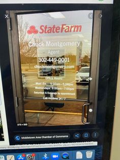 a computer screen with the state farm advertisement on it's display window in front of a car dealership