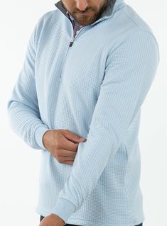 Made with a performance waffle-knit polyester fabric, this men’s pullover quarter-zip is designed to be breathable, allowing you to stay dry even as it keeps you warm. With an athletic look and feel, you’ll be stepping onto the golf course with style. Waffle-knit polyester fabric Vent on the upper back that aids airflow The waist features a drawcord to hold the bottom closed 100% Micro Polyester Sporty Half-zip Sweater With Ribbed Cuffs, Sporty Long Sleeve Polo Sweater With Ribbed Cuffs, Sporty Long Sleeve Waffle Knit Top, Sporty Waffle Knit Long Sleeve Tops, Athletic Looks, Outdoor Workouts, Sporty Look, Waffle Knit, Golf Course