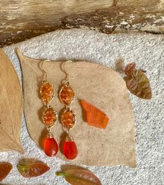 Gold filled dangle earrings with carnelian gemstones Orange Czech Glass Dangle Earrings, Orange Gemstone Drop Earrings, Orange Natural Stones Drop Earrings, Orange Natural Stone Drop Earrings, Red Faceted Carnelian Jewelry, Orange Czech Glass Jewelry With Ear Wire, Orange Gemstone Dangle Earrings, Agate Drop Earrings Gift, Agate Drop Earrings For Gift