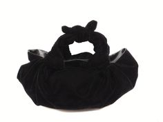 Black velvet knot handbag It is fully lined, and despite of it's small size, it has enough spaces to carry the essentials.. Outershell: velvet Linng: Satin  Measurements: approx 28cm x 15cm / 6"x11" Sizes may vary slightly between each bag as it is handcrafted. Draping and knots vary from bag to bag, every bag is unique Care:  Dry Clean or You could wash the bag with warm water & shower gel, rub gently, rinse well, and drip dry (do not wring) to avoid wrinkle, one the bag is dry thoroughly, stea Black Velvet Rectangular Bag, Black Rectangular Velvet Bags, Black Velvet Rectangular Bags, Chic Velvet Rectangular Bag, Chic Rectangular Velvet Bag, Elegant Black Velvet Bag, Elegant Black Velvet Bags, Chic Evening Velvet Bag, Evening Pouch Bag With Rolled Handles