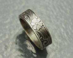 Sterling Silver Ring, Antique Flower Pattern, Custom Wedding Band Custom made Sterling Silver ring that I designed, pressing the thick sterling silver into a beautiful pattern, using a ring die that was made in the early 1900's with the strength from my hydraulic press.  I then soldered and hand polished the silver then I lightly applied a patina to bring out all the beautiful details.  This antique flower pattern that has the look of being hand engraved.  Ring is Size 7 Top of ring measures: 1/