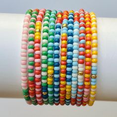 Complete Sunshine Collection Colorful Stackable Boho Seed Bead Stretch Bracelets Set of 12 - Etsy Cheap Multicolor Single Strand Beaded Bracelets, Cheap Flexible Multicolor Beaded Bracelets, Cheap Playful Rainbow Stretch Bracelet, Cheap Rainbow Beaded Bracelets With Tiny Beads, Multicolor Stackable Stretch Bracelet With Round Beads, Multicolor Stackable Friendship Bracelets With Round Beads, Multicolor Stackable Beaded Bracelets, Seed Bead Stretch Bracelets, Sunshine Bracelet