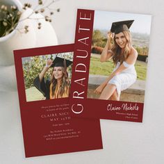 two graduation announcements are displayed on a table