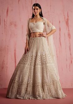 Roqa-Amayra Ivory Lehenga Set-INDIASPOPUP.COM Ritu Beri, Ivory Lehenga, Strappy Blouse, Personal Shopping Service, Floral Motifs, Indian Design, Photographic Lighting, Handmade Clothes, Personal Stylist