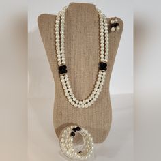 This Listing Is For A 3-Piece Jewelry Set. The Set Consists Of A Double Strand White Pearl And Black Pearl Necklace With Rhinestone Accents - 23.5” A 3 Coil Wrap Bracelet - White Pearls, Black Pearls, And Rhinestones - 6.5” Drop Earrings- 1.5” White And Black Pearls Elegant Festive Classic Bridal Stylish Sophisticated Vintage-Like Victorian Modest Handmade By Me. New Pearl Necklace Set Elegant Black Beads Jewelry For Evening, Elegant Black Beaded Jewelry For Evening, Elegant Black Beaded Evening Jewelry, Elegant Black Beaded Jewelry, Elegant Formal Jewelry With Black Beads, Elegant Black Beaded Jewelry For Formal Occasions, Elegant Formal Black Beaded Jewelry, Black Beaded Pearl Jewelry For Parties, Party Jewelry With Black Pearl Beads