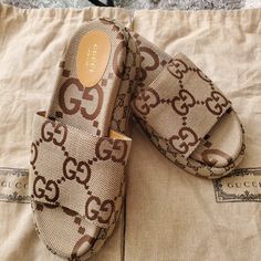 Gucci Slides : Never Worn,Has Shoe Garment Bags,No Box, Size 40/10d Elegant Gucci Beige Sandals, Gucci Brown Sandals For The Beach, Gucci Luxury Brown Sandals, Luxury Gucci Sandals For Vacation, Designer Brown Sandals For Vacation, Gucci Luxury Beach Sandals, Gucci Slides, Shoes Gucci, Garment Bags