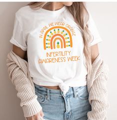 Support the infertility awareness cause with this adorable pineapple rainbow design! Need a more custom design? Please reach out! I would love to accommodate! I love doing custom work. Here are some similar and matching items that you may be interested in!: https://www.etsy.com/shop/LovelyJaynesBoutique?ref=seller-platform-mcnav&search_query=infertility  classic unisex jersey short sleeve tee fits like a well-loved favorite. Soft cotton and quality print make users fall in love with it over and White Graphic Print Tops For Awareness Events, White Cotton T-shirt For Awareness Events, White Cotton Tops For Awareness Events, Rainbow Pineapple, Orange Rainbow, Pineapple Shirt, Sublime Shirt, Orange Orange, Awareness Shirt