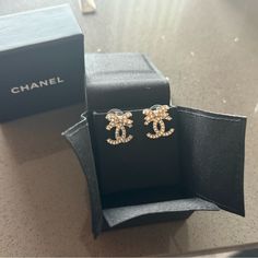 Chanel Cc Earrings With A Bow Brand New With Receipt And The Box The Metal Is Gold With Silver Rhinestones Chanel Earrings Cc, Channel Earrings, Cc Earrings, Chanel Earrings, Chanel Jewelry, Jewelry Brand, Perfume Collection, Silver Rhinestone, Dream Jewelry