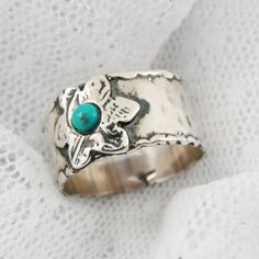 Floral ring. Sterling silver ring. Turquoise ring. Silver turquoise ring. Wide ring. (sr-9625). birthday gift for her, turquoise jewelry  ☀About the Ring:The ring is made of sterling silver 925 with a turquoise stone.The ring width is 10 mm.☀  All rings are packaged and shipped in a beautiful gift box.It takes about 1-2 weeks to make the ring. ☀  The turquoise is genuine and can be different for every ring. Thank you for visiting my shop! Have a beautiful day :)Maya. Silver Turquoise Birthstone Ring For Anniversary, Silver Turquoise Ring As A Gift, Silver Turquoise Open Ring For Anniversary, Nickel-free Silver Turquoise Ring For Anniversary, Anniversary Silver Turquoise Open Ring, Silver Turquoise Open Ring Promise Ring, Silver Turquoise Ring, Cowgirl Jewelry, Metal Clay Jewelry