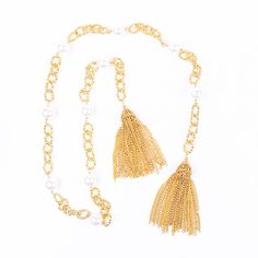 Product Description: Gold chain necklace with 18mm pearls and gold tassel ends. Dimensions: 54" long Gold Chain Necklace, Gold Chain, Gold Chains, Tassels, Chain Necklace, Product Description, Chain, Gold