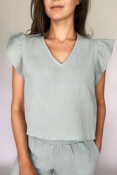 A woman modeling a sea blue cotton gauze ruffled sleeve top with matching pants Cotton Gauze Clothing, Double Gauze Top, Gauze Clothing, Gauze Shirt, Lounge Looks, Gauze Top, Diy Tops, Ruffled Sleeve Top, Double Gauze