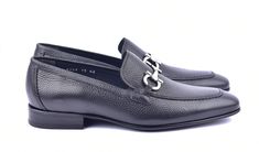 Corrente Grain Leather Loafer Black Elegant Grain Leather slip-on Loafer from the Corrente collection features soft Calfskin lining, Silvertone Bit Hardware detail, a clean welt and a full Leather Sole! Please Note: Many sizes are sold out until mid June. Elegant Formal Slip-ons With Textured Sole, Elegant Office Slip-ons With Leather Lining, Elegant Semi-formal Loafers With Textured Sole, Elegant Slip-on Business Moccasins, Elegant Slip-ons For Galas With Plain Toe, Elegant Business Moccasins With Rubber Sole, Elegant Moccasins With Textured Sole For Semi-formal Occasions, Elegant Semi-formal Slip-ons With Leather Lining, Elegant Moccasins With Textured Sole And Plain Toe