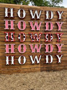 a wooden sign that has the words how do you know? written in red and white letters