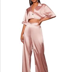 Light Pink Satin Crop And Pant Set. Never Worn Chic Pink Two-piece Bottoms, Elegant Two-piece Bottoms For Spring, Chic Spring Pant Set For Night Out, Chic Two-piece Bottoms For Date Night, Chic Solid Color Pant Set For Party, Elegant Cropped Bottoms For Date Night, Satin Bottoms For Summer Date Night, Pink Wide Leg Sets For Night Out, Satin Bottoms For Date Night In Summer