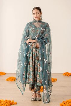 Introducing this exquisite Pure Cotton Green Floral Printed Anarkali Suit Set - the perfect choice for creating a sublimely stylish look. Expertly crafted from cotton, its delightful floral print sets it apart as a truly luxurious piece for summer evenings and garden parties. Comfortably flattering, it makes a timelessly tasteful style statement. No. of set : 3 pieces Color : Green multicolor Fabric : Pure Cotton Kurta Length : 40 inches Pant Length : 38 inches Washing Instructions : Dry Clean Festive Anarkali Set With Printed Motifs And Long Sleeves, Festive Long Sleeve Anarkali Set With Printed Motifs, Chanderi Sharara With Printed Motifs For Eid, Unstitched Floral Embroidery Anarkali Set, Eid Sharara With Printed Motifs In Chanderi, Anarkali Set With Floral Embroidery, Floor-length Palazzo Set With Floral Print For Diwali, Cotton Silk Sharara With Printed Motifs, Green Cotton Silk Anarkali Set With Floral Embroidery