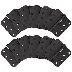 six pieces of black plastic with holes on each side and one piece missing from the back