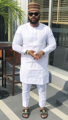 Neatly sewn, men 2 piece shirt and trouser, for that classic man with a classic look. Kaftan Ideas, African Suits, Hebrew Clothing, Costume Africain, African Suit, To Start A Conversation