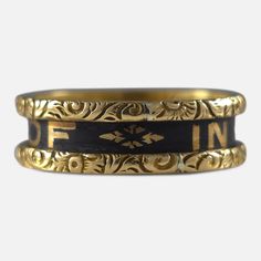 Victorian 18ct yellow gold and black enamel memorial mourning ring, inscribed with 'IN MEMORY OF' within a gold foliate border and 'Mary Alice Holbrey, Born May 12, 1860. Died April 17, 1873' inside. Hallmarked Birmingham, 1874, '18' for 18 carat gold. * Period: Late 19th Century. * Date: 1874. * Maker: 'H&U'. * Measurement: UK size M (leading edge), US size 6 1/4 (leading edge). Band width approximately 5.7mm. * Weight: 4.5 grams. Condition: Good, with minor surface scratches. Enamel in good co Memorial Ring, Art Deco Era, Locket Necklace, Chains For Men, Stackable Rings, Black Enamel, Birmingham, Chains Necklace, Antique Jewelry