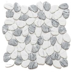 white and grey pebbles are arranged in a square pattern