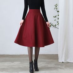 "★★ FEATURES * Wool skirt * Polyester lining * Two side pockets * Right zipper closure * back little elastic waistband * A Line wool Skirt * Midi wool sirt * Perfect for Winter, autumn * Dry clean ★★ The model is 170 cm (5′ 7″) tall with a 80 cm (31.5\") bust, 66 cm (26\") waist. She is wearing the burgundy wool skirt in size XS. ★★ Please select custom order according to the follow situation Your height is not between 155 cm- 175 cm Your weight is over 75 kg Request the length Reequest other co Winter A-line Solid Color Bottoms, Winter A-line Bottoms In Solid Color, Winter Solid Lined Skirt, Winter Solid Color Lined Skirt, Solid Winter Bottoms With Lined Skirt, A-line Skirt In Solid Color For Fall, Solid Color Skirt For Winter Workwear, Solid Color Winter Workwear Skirt, Winter Midi Skirt In Solid Color