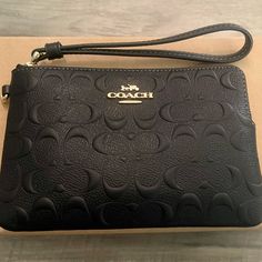 Brand New With Tags And Absolutely Gorgeous Describes This Authentic Coach Corner Zip Wristlet In Black Signature Leather. Color: Gold/Black Signature Smooth Calf Leather Two Credit Card Slots Zip-Top Closure, Fabric Lining Wrist Strap Attached Measures: 6 1/4" (L) X 4" (H) X 1/2" (W) Black Clutch Wristlet For Formal Occasions, Rectangular Black Wristlet As A Gift, Black Wallets With Wrist Strap For Evening, Black Formal Wristlet With Removable Pouch, Black Evening Wallet With Wrist Strap, Black Formal Clutch Wristlet, Black Rectangular Wristlet For Gift, Formal Black Wristlet With Removable Pouch, Black Wallet With Wrist Strap For Gift