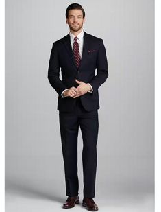 Expertly crafted with a touch of stretch, this refined suit from Jos. A. Bank keeps you moving comfortably so you can get down to business. The jacket has a two-button closure, notch lapel, interior pockets and side vents. The flat-front slacks are unhemmed for easy alteration. Cotton pouch pockets. 51% wool, 47% polyester, 2% spandex. Dry clean only. Imported. * Pants unfinshished hem for alteration ease * Pant cotton pouch pockets * Side vent * Jacket, interior buttons, 2 button front closure, notch collar * Blue herringbone pattern * Follow garment instructions for washing purposes. * 51% wool 47% polyester 2% spandex Slim Fit Single Button Business Casual Suit, Single Button Slim Fit Suit For Business Casual, Slim Fit Business Casual Suit With Hidden Buttons, Slim Fit Suit With Pressed Crease For Business Casual, Slim Fit Suits With Pressed Crease For Business Casual, Slim Fit Professional Suits With Welt Pockets, Professional Slim Fit Suits With Welt Pockets, Slim Fit Notch Lapel Suits For Business Trips, Custom Fit Notch Lapel Suits For Business Casual