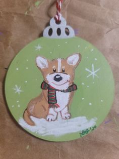 a christmas ornament with a dog on it