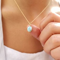 "LARIMAR-NECKLACE                                                          () 100 % Natural, No dye or Coloring () The necklace is very elegant and has the perfect size for daily wear, it is a perfect gift for yourself and your loved ones. Larimar Necklace is completely natural and hand made. The back of the pendat is open so that the stone touches your skin. After your order, we choose the most beautiful stone for you and produce it specifically for you in the color and length you want.    Meterial : High Quality 925 Sterling Silver -Gold Plated -Rose Gold Plated -14K Solid Real Gold  Stone size  : 8x10 mm Oval Shape  Cutting Type of Stone : Cabochon                                           WHAT IS THE LARIMAR STONE GOOD FOR ?                        Larimar is best known to be a healing Larimar Gemstone Pendant Necklaces, Larimar Gemstone Pendant Necklace, Turquoise Aquamarine Necklace For Gift, Gift Turquoise Aquamarine Necklace, Spiritual Larimar Gemstone Necklace, Larimar Cabochon Jewelry Gift, Blue Amazonite Necklaces For Gift, Blue Amazonite Necklace For Gift, Blue Amazonite Necklace Gift