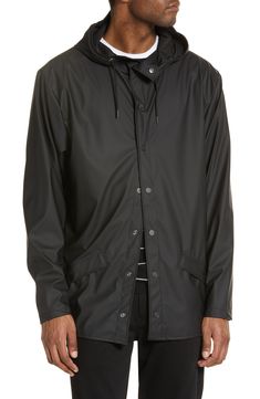 A minimalist raincoat with a matte waterproof finish is lightweight, durable and packable so you can be ready for whatever Mother Nature throws your way. 30" length (size Small) Front snap closure Stand collar; drawstring hood Waterproof 100% polyester with polyurethane coating Machine wash, line dry Imported