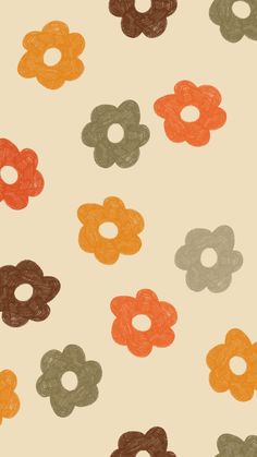 an orange, brown, and green flower pattern on a white background with circles in the middle