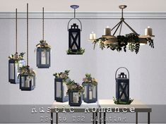 a bunch of lanterns hanging from the ceiling above a table with plants on it and candles in them