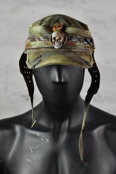 Postapoc Cap - Military Style Cap - Wasteland LARP Headpiece - Army Green Cap - LARP Accessories - Post Apocalyptic Hat - Handmade Headwear A unique post-apocalyptic styled cap. An olive green base, decorated with leather straps and stylish ear flaps. It's a unique costume piece that will add a spark of life to any military-style outfit! Finished with professional paintwork for a distressed effect, it has a very lifelike feel of a worn down headpiece. It's a one size product. More apocalyptic clothing: https://etsy.me/3Z2OHJ5 More accessories: https://etsy.me/2jskDVG MY ETSY SHOP: https://www.etsy.com/shop/WastedCouture Wear if you dare! --------------------------------------------------------------------- Wasted - Wasted Couture - WastedCouture Alternative Style Adjustable Cap, Adjustable Alternative Style Cap, Punk Style Adjustable Baseball Cap, Punk Style Adjustable Visor Hat, Adjustable Punk Style Baseball Cap, Adjustable Punk Visor Hat, Adjustable Punk Style Visor Hat, Punk Style Festival Cap, Punk Style Cap For Festivals