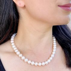 Classic single line of pearl string. A timeless look, 9mm pearls expertly strung to create a sleek and sophisticated necklace. Length - 42 cm Weight - 60.50 GMs Timeless Round Pearl Necklace For Formal Occasions, Classic Formal Bridal Necklace With Pearl Chain, Single Strand Akoya Pearl Bracelet In Pearl White, Adjustable Round Pearl Necklace, Formal Single Strand Pearl Bridal Necklace, Classic Pearl Bridal Necklace For Formal Occasions, Classic Single Strand Round Pearl Necklace, Classic Single Strand Pearl Necklace, Classic Pearl White Necklaces With Pearl Chain