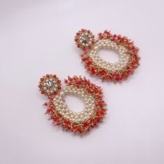 - Ships in 1 business day - 100% Handmade - Pearls, Orange Beads, Gold Filled Metal - Measure: 3.5 Inches Length Long, 3 Inches Width - Weight: 1.6 Ounce (46 grams) the pair Stud Drop Earrings, Beaded Fringe Earrings, Festival Earrings, Earrings Round, Beaded Fringe, Fringe Earrings, Pearl Studs, Round Earrings, Beautiful Earrings