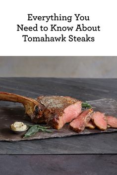 a piece of steak sitting on top of a wooden cutting board