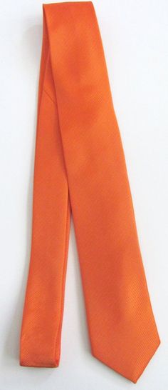 This trendy skinny tie is made of a 100% silk, all new material.It measures 58" long and 2" at the widest point. Orange Tie Outfit Men, Multicolor Standard Tie For Semi-formal Occasions, Orange Tie-side Beachy Swimwear, Orange Standard Business Tie, Orange Tie, New Material, Silk Necktie, Necktie, Neck Tie