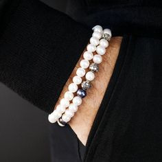 About Specifications Less is More. This bracelet is composed solely of natural white pearls and adapts fluidly to any outfit. Unlike mined gemstones, pearls are a unique organic creation, each one a testament to the wonders of nature. Gems: Natural White Pearl Stone size: 7-8mm Metal: 925 Sterling silver Cord: Steel wire (slightly looser fitting.) Packaging: Comes with a linen pouch (Due to the unique characteristics of natural stone, the size and color of the beads can vary slightly.) Polynesian Tattoos, Linen Pouch, Unique Opal, Pearl Stone, Unique Characteristics, Mens Beaded Bracelets, Jasper Stone, Bracelet Collection, The Pearl