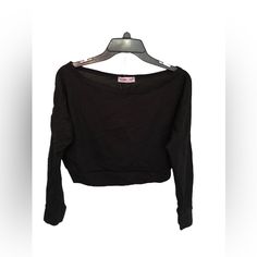 Women Black Color Femme Luxe Off Shoulder Top Size M/L Trendy Black Tops For Night Out, Black Crew Neck Top For Night Out, Trendy Black Top For Night Out, Chic Black Crew Neck Top, Black Crop Top For A Night Out, Black Long Sleeve Cotton Crop Top, Casual Black Long Sleeve Crop Top, Casual Black Stretch Crop Top, Trendy Black Crew Neck Crop Top