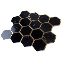 black and gold hexagonal tiles on a white background