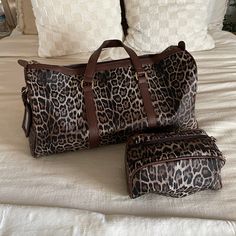 ★ Large leopard print duffle bag with pouch set ★ Lining & inner pocket details for both bags ★ Color: Leopard/ Brown ★ Duffle Bag: 20" x 12" x 13" Pouch: 9.5" x 5" *Final Sale* More info: Returns & Exchanges Trendy Leopard Print Travel Bag, Leopard Print Tote Travel Bag, Leopard Print Travel Tote Bag, Travel Leopard Print Shoulder Bag, Leopard Print Travel Satchel Shoulder Bag, Leopard Print Satchel Travel Bag, Leopard Print Travel Bag With Large Capacity, Large Capacity Leopard Print Shoulder Bag For Travel, Leopard Print Large Capacity Travel Bag