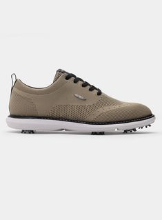 A refined golf shoe with a knit upper and classic wingtip style lines. Polo Quarter Zip, Golf Shoe, Golf Shoes, Quarter Zip Pullover, Short Jacket, Men's Collection, Mens Belts, Bottoms Pants, Short Pants