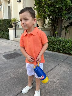 Reference: V24-214/ V24-300 Color: Orange & White Materials: Polo shirt is 100% cotton. Shorts 100% cotton. Description: This boy set is a timeless ensemble for spring that effortlessly combines style and comfort. The set features a piquet polo in orange and the matching white shorts. The white shorts, complete with an elasticated waistband for a snug fit, are perfect wardrobe staples. Available in sizes 12 months to 12 years, this ensemble is a nod to classic elegance, making it an ideal choice Summer Cotton Polo Shirt For School, Summer School Cotton Polo Shirt, Summer Polo Shirt With Contrast Trim, Sporty White Polo Shirt With Contrast Trim, White Color Block Polo Shirt, Cotton Polo Collar T-shirt With Letter Print, Kids Polo T-shirt, Fashion Boy, This Boy