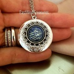 -Locket Says : Besmellah Al Rahman Al Rahim= In the name of Merciful God-DimensionsLocket height: 1 Inches; Locket width: 1 Inches-Locket Options:1. LOCKET AS IS-You will get the Locket necklace and you insert your own image or message2.LOCKET+MESSAGE-I will insert a custom message in the locket for you-You have option to write the message at check out, up to 80 characters3.LOCKET+One Photo-Please email me a clear image you need me to use4.LOCKET+MESSAGE & PHOTO-I will insert one image and o Etched Pendant Locket Necklace As A Gift, Personalized Amulet Jewelry For Collectors, Father's Day Medallion Jewelry Gift, Spiritual Antique Silver Locket Necklace Gift, Etched Blue Jewelry For Gift, Silver Amulet Style Locket Necklace As A Gift, Silver Round Amulet Locket Necklace, Engraved Amulet Locket Necklace As Gift, Engraved Amulet Locket Necklace For Gift