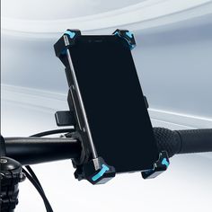 a cell phone mounted to the handlebars of a bike with blue lights on it