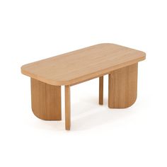 a wooden table sitting on top of a white floor