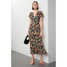 Black floral chiffon (100% Viscose). Lining (100% Polyester). Slip. Short sleeves. V-neck. 58.5" from shoulder to hemline. Imported. Elegant Floral Print V-neck Chiffon Dress, Chic Flowy V-neck Dress With Floral Print, Floral Print V-neck Dress For Spring Evening, Elegant Flowy V-neck Dress With Floral Print, Spring Floral Print V-neck Chiffon Dress, Chic Floral Printed V-neck Dress, Chic Fitted Floral Print Chiffon Dress, Casual Black Chiffon Dress With Floral Print, Formal Floral Print Dress With Surplice Neckline