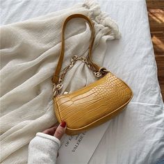 Brand Name: ZECKShape: FLAPPlace Of Origin: HE BEI ?ProvinceHandbags Type: Shoulder BagsTypes of bags: Shoulder HandbagsOrigin: CN(Origin)Main Material: PUClosure Type: zipperHardness: SOFTStyle: FashionModel Number: 1132-23022Lining Material: PolyesterOccasion: VersatileGender: WOMENPattern Type: SolidNumber of Handles/Straps: SingleInterior: Cell Phone PocketDecoration: ChainsItem Type: Handbags Daisy Accessories, Baguette Bags, Pu Bag, Crocodile Bags, Grunge Look, Crocodile Pattern, Beautiful Handbags, Baguette Bag, Bag Trends