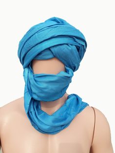 Genuine Handmade Sky Blue Tuareg Scarf, Long Moroccan Berber Turban, Tribal scarf, Ethnic turban, Tuareg Tagelmust, Berber, Turban, Long Turban, African Scarf, Moroccan Turban, Moroccan Scarf, Tribal tie dye scarf, Tuareg head wrap These Scarves are for Women and Men. They are worn to protect them against sun and sand as these people travel in the desert. They are a very soft hand woven fabric of cotton. This is a lovely item to own or to give as a special gift If you find yourself attracted to Bohemian Wrap Turban One Size, Bohemian Wrap Turban, Blue Bohemian Headwrap One Size, Blue Bohemian One-size Headwrap, Blue One-size Headwrap For The Beach, Blue One Size Headwrap For Beach, Blue Headwrap For The Beach, Gray Eyeliner, African Scarf