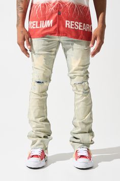 SERENEDE® "SULFUR" stacked jeans feature a light blue wash with bleached accents, a fitted construction, and a stacked finish. Go with your regular waist size. This style fits like our usual sizing with added stack to the bottom of the leg. THIS STYLE IS A STACKED JEAN AND HAS A WIDER LEG OPENING. PLEASE ORDER YOUR USUAL SIZE FOR THIS PARTICULAR LOOSER FIT AROUND YOUR LEGS. DETAILED FEATURES: Stretchability: MEDIUM STRETCH Vintage light blue denim base with bleached fading Distressing throughout Urban Style Distressed Fitted Flare Jeans, Urban Distressed Fitted Flare Jeans, Distressed Fitted Urban Flare Jeans, Ripped Fitted Flare Jeans For Streetwear, Fitted Ripped Flare Jeans For Streetwear, Fitted Distressed Flare Jeans For Streetwear, Ripped Light Wash Flare Jeans For Streetwear, Distressed Blue Flare Jeans For Streetwear, Blue Washed Flare Jeans For Streetwear